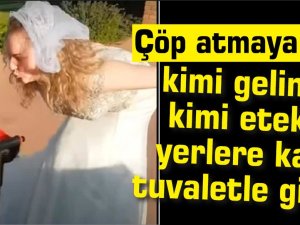 Çöp atmaya giderken şık giyinme:Gelinliğini giydi