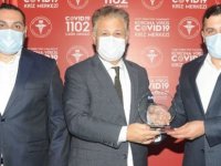 Bakan Pilli’ye Covid-19 süresi içersinde verdiği hizmetler nedeniyle plaket takdim edildi