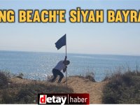 Çarpıcı Eylem: İskele Sahiline Siyah Bayrak