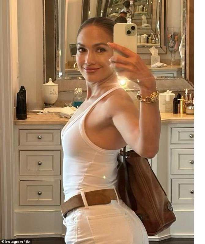 87568971-13654483-jennifer_lopez_54_was_all_smiles_in_a_new_post_on_social_media_s-a-17_1721494213287.jpg